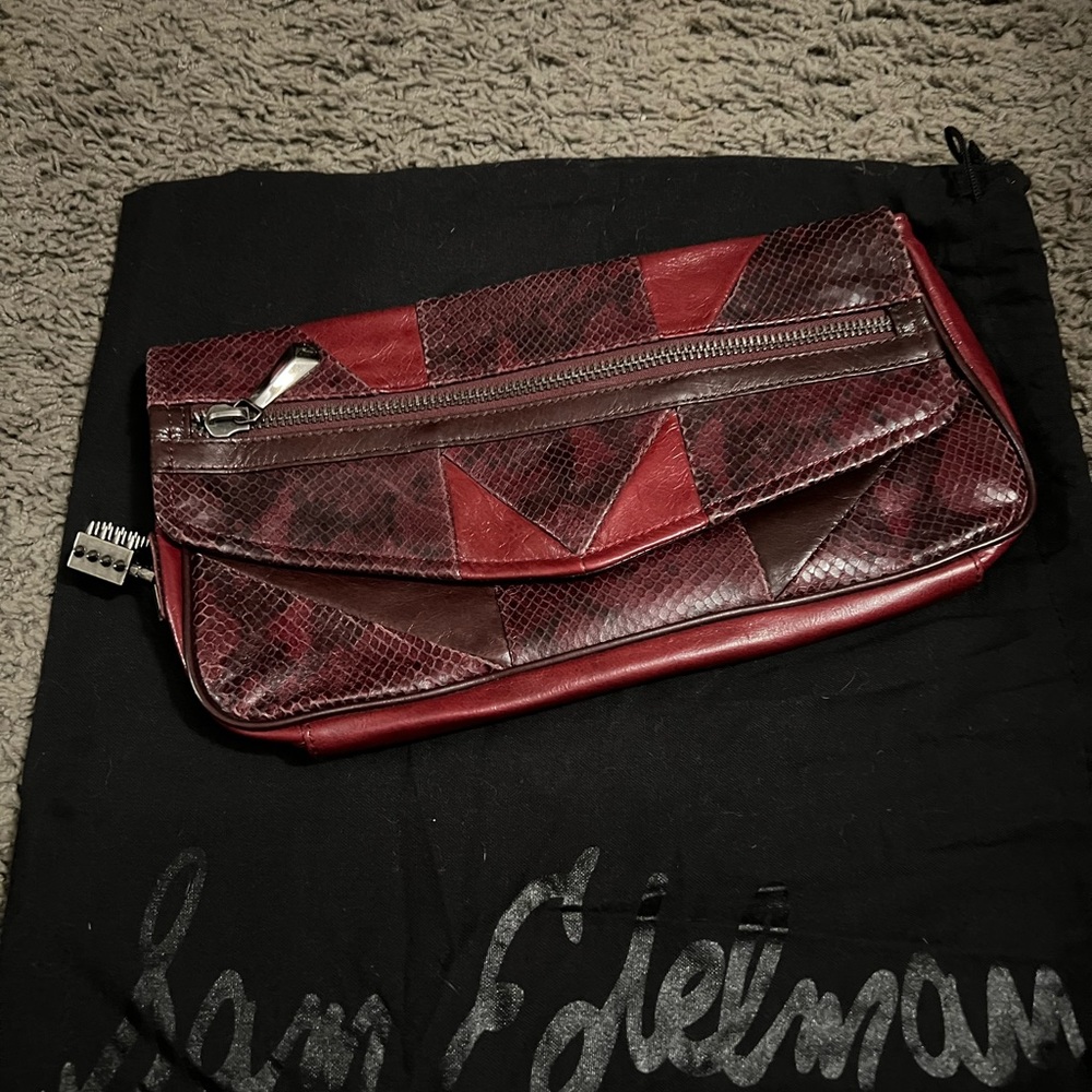 Sam eldermsn geuine leather clutch
